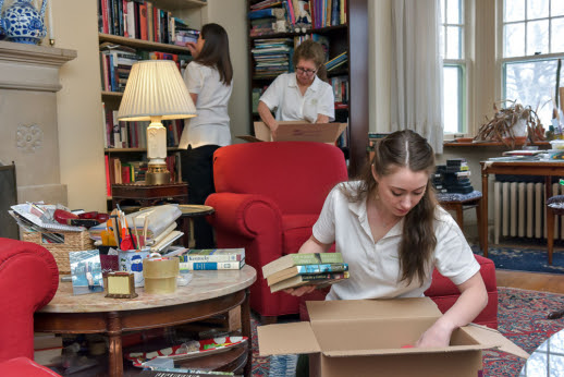 People organizing into boxes for move