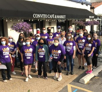 Team in front of cafe for Alzheimer's Walk